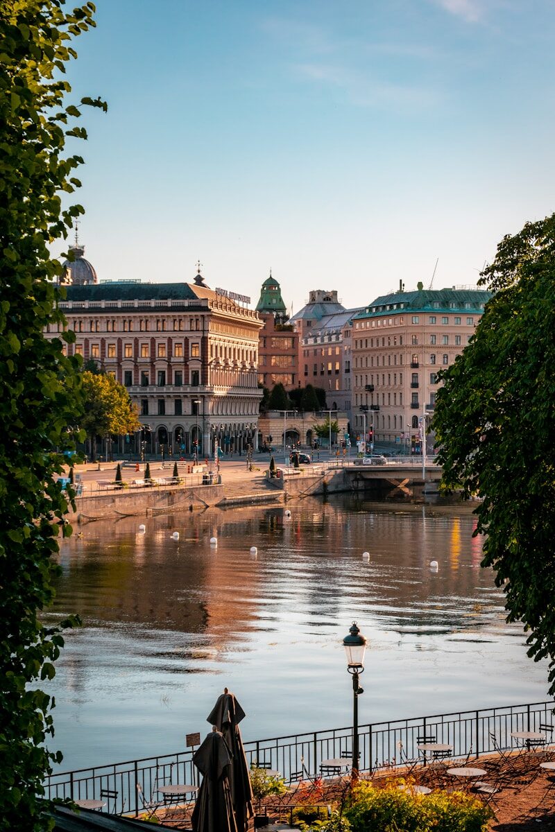 a body of water with buildings around it